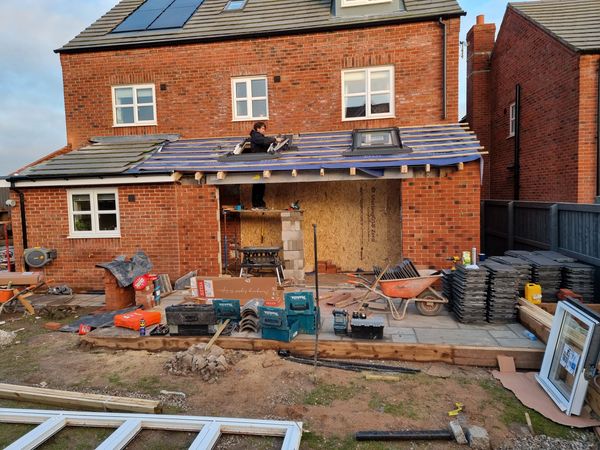 NEW OPENING CREATING A VERY LARGE LIVING SPACE ON A NEW BUILD, WITH ELECTRIC VELUX WINDOWS AND BLIND