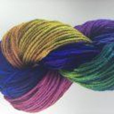 Yellow, green, purple and pink mottled yarn