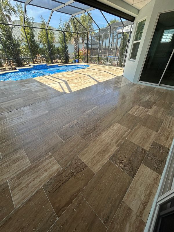 Luxury travertine sealing in Halifax Plantation for elegant outdoor living spaces.