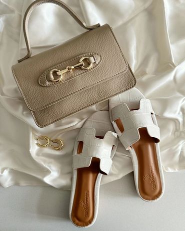 Italian purse, gold hoop earrings and white sandals