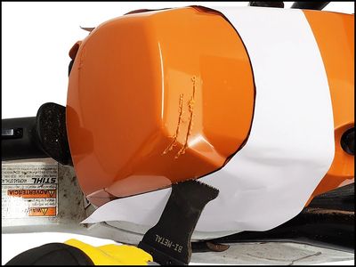 Stihl MS462 shroud being trimmed.