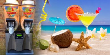 Tropical frozen drink machine and beach cocktail setup with coconut and starfish.