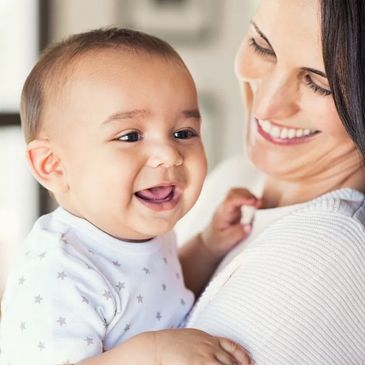 Happy baby with nanny
