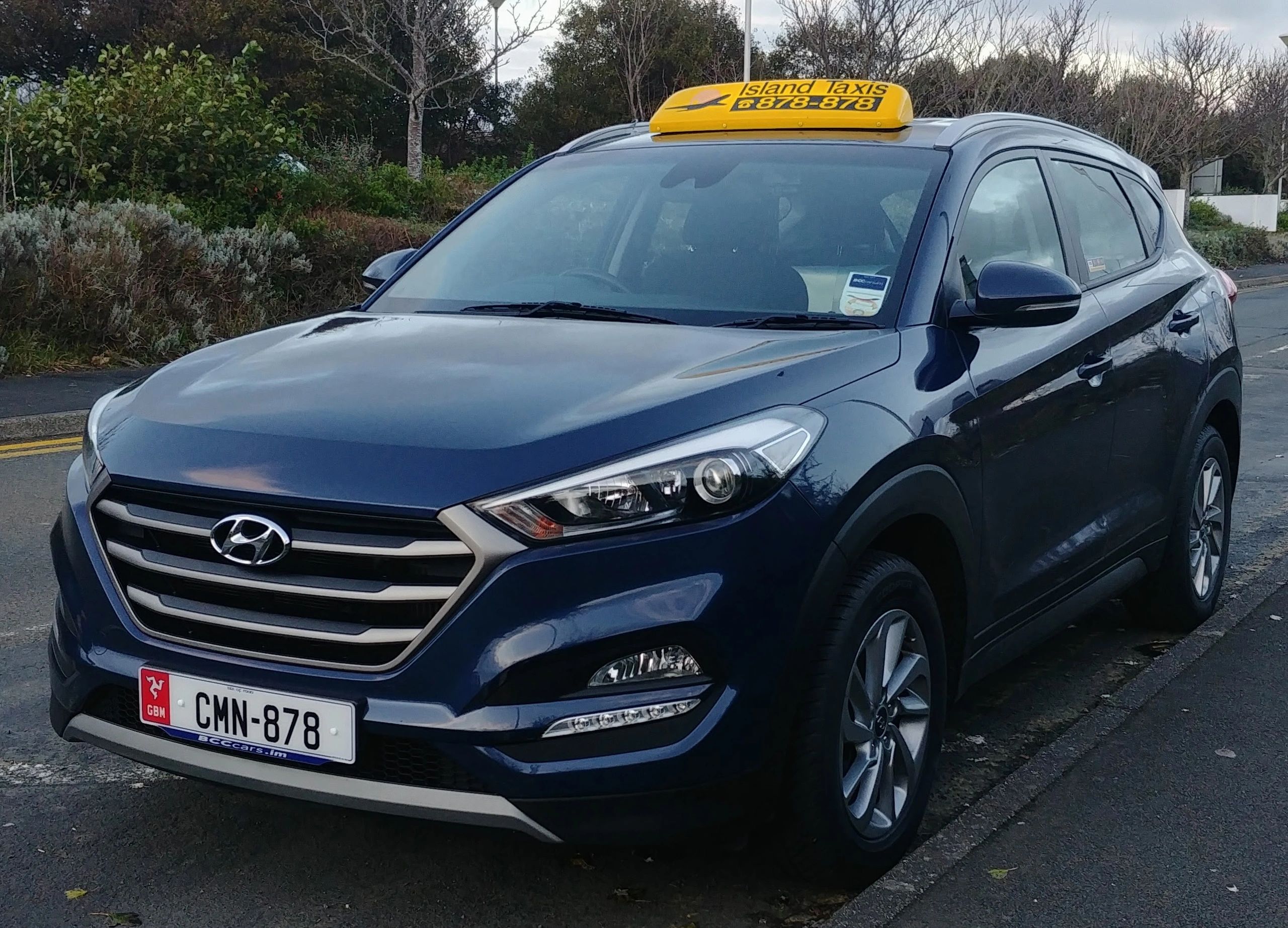Island Taxis Limited blue Hyundai Tucson Taxi pictured on the pre-booked rank at Isle of man airport