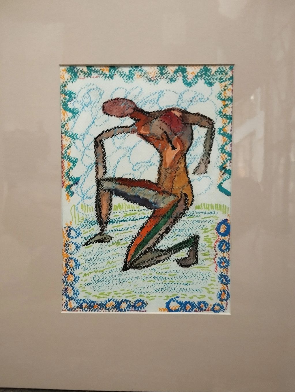 Abstract artwork of a kneeling figure with vibrant colors and patterns.