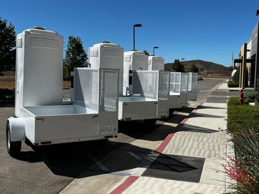 Fleet of industrial portable restroom trailers built for municipal use by BAUSS Manufacturing