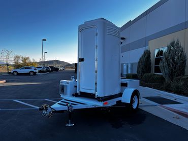 alt="Heavy-duty restroom trailer for emergency medical field hospitals"