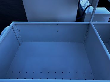 alt="Utility restroom trailer positioned at emergency staging area"