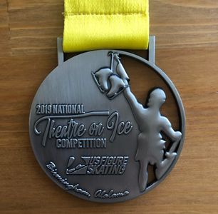 national Theatre on Ice pewter medallist : ice skating figure skater