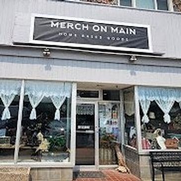 Cozy storefront of Merch on Main with artisan created home decor.