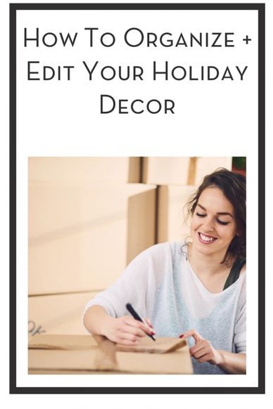 How To Organize And Edit Your Holiday Decor - A happy woman writing on a box with boxes around her