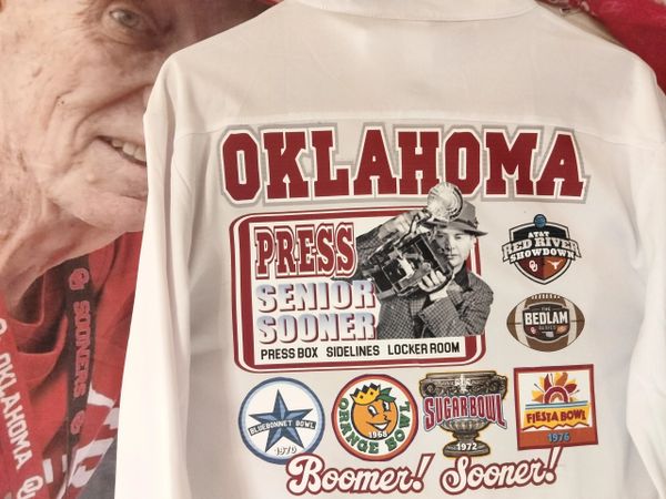 The back of "THE One and Only" shirt, showing my sportswriting career highlights covering OU.