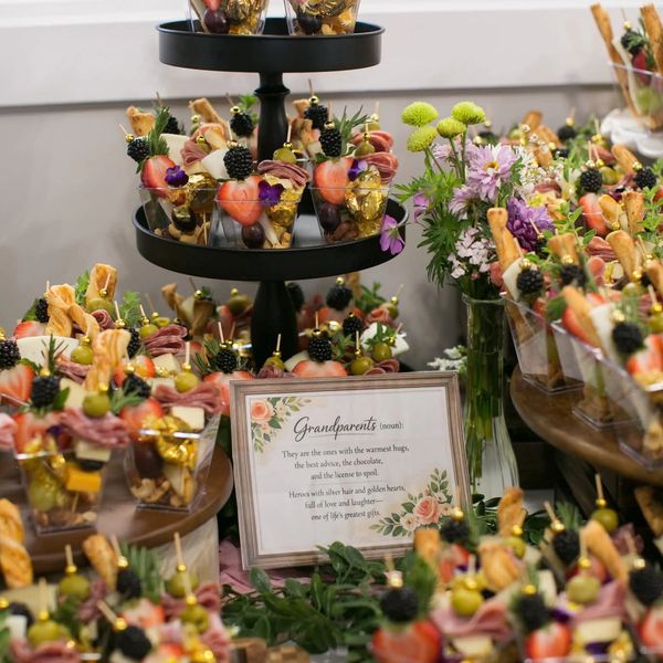 Elegant parfaits with fruits and flowers, celebrating grandparents.