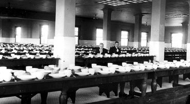 Dining area for immigrants at Ellis Island, New York City, back in the day.