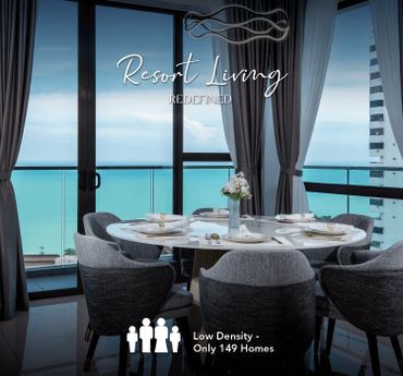 Elegant dining area with ocean view and modern decor, promoting low-density resort living.