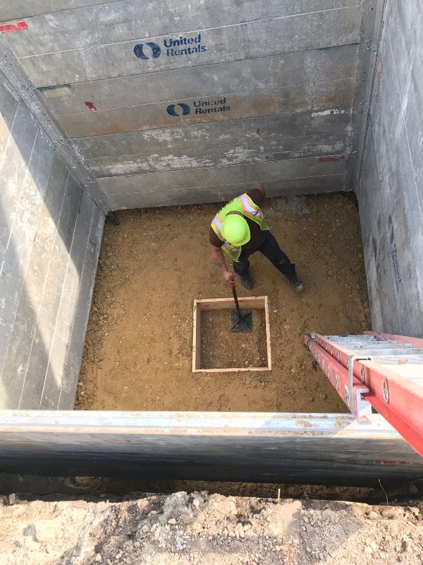 Power Source worker in safety gear on a project in progress