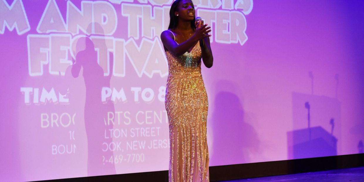 Just Be You Performing Arts Film & Theater Festival teen co-host Adora McDaniel performs live.