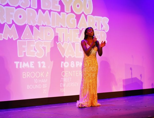 Adora Danae performing live at the inaugural Just Be You Performing Arts Youth Film Festival.