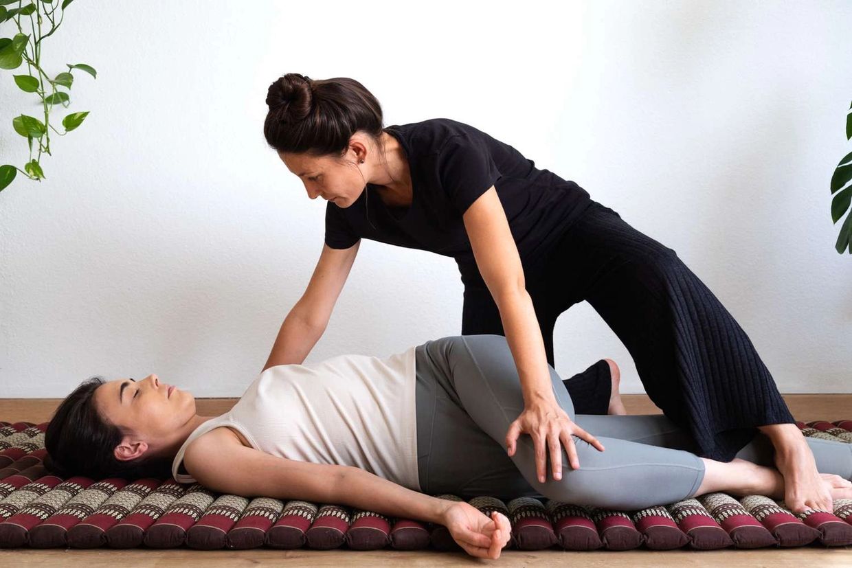 Experience the rejuvenation benefits of a Thai Massage, a holistic therapy that blends acupressure, 