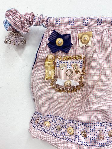 Matriarch, Apron, Ribbon, Embellishments, Wire, Fiber, 21” x 31” x 7.5”, 2022
