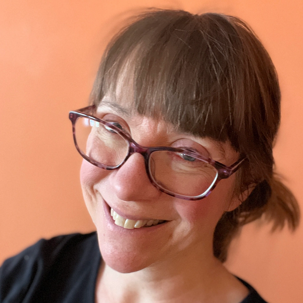 smiling woman with glasses