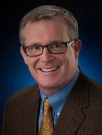 headshot of Denver Stutler, Past Chair