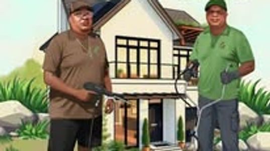 Two men standing outside a modern house, holding gardening tools.