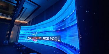 Curved LED and Staging options customised for your event and retreat size