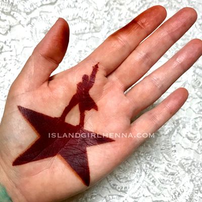 Broadway musical Hamilton logo in henna. Proper henna design care instructions.