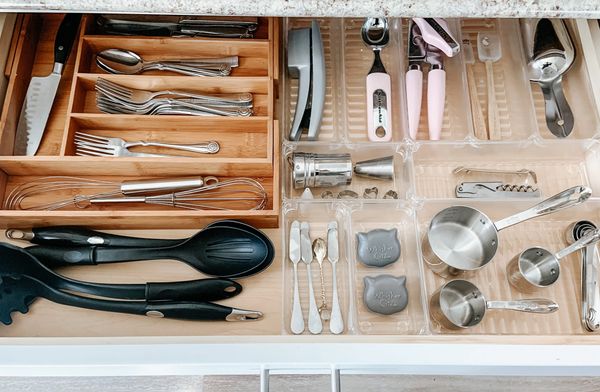 Kitchen drawers organized with dividers and containers by Arranged by Ashley, NJ home organizer