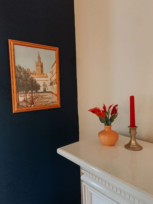 Functional family room with hidden storage by Arranged by Ashley, Jersey Shore home organizer