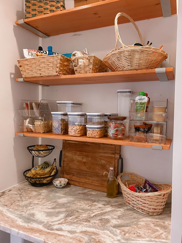 Pantry shelf organized with baskets by Arranged by Ashley, Lacey twp NJ. professional organizer NJ