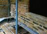 Wall rebuild and support for back extension