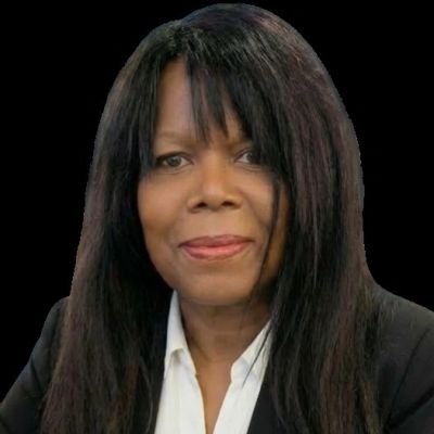 Professional portrait of a woman with long black hair.