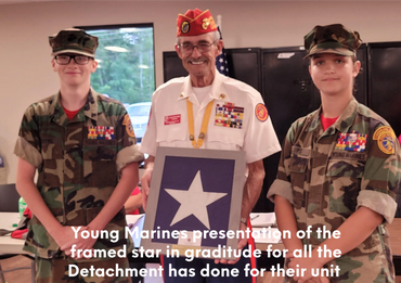 Young Marines presentation the framed star in gratitude for all our detachment has done their unit
