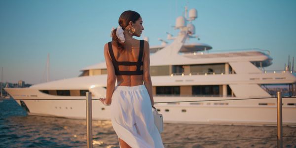 Lady onboard her Luxury Yacht Life