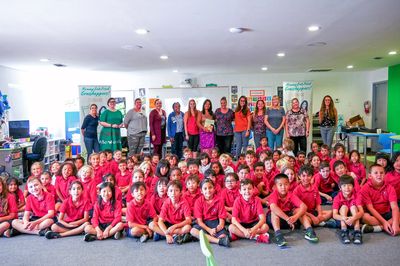 Author Vilayvanh Bender with students and teachers