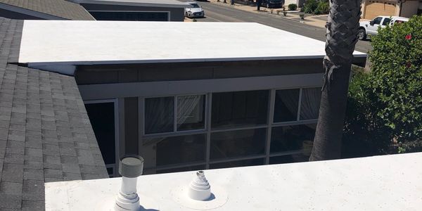 Shingle roofs with low sloped sections. Elite Roof Services can offer Torch Down Roof Systems or The