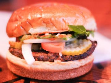 Black Bean Burger, Lettuce, Tomatoes, Pickles, Onions, Ketchup, Mustard, Mayo served on a Brioche Bu