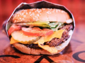 1/3 lb Creekstone Burger, American Cheese, Lettuce, Tomato, Pickles, Onions, Ketchup, Mustard, Mayo