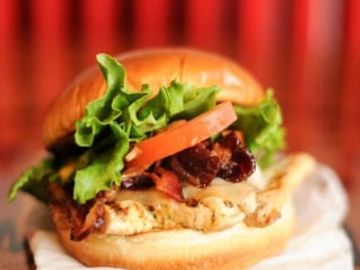 Grilled Chicken Breast, Beef Bacon, Swiss cheese, Lettuce, Tomato, & Honey Mustard served on a Brioc