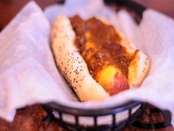 Jumbo Hot Dog, Melted cheddar cheese & Vienna Beef Chili served on steamed poppy seed bun