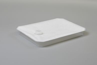 Single use tray with protective membrane and filling port, from Teclen.