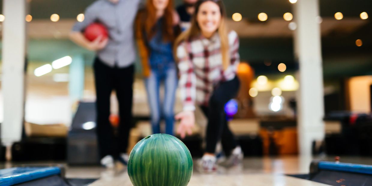 Friends bowling