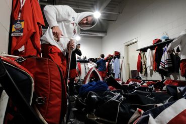 Nolan Bivolcic wraps his stick before the 2022 ACHA National Tournament.