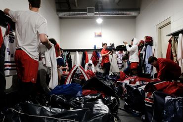 University of Arizona hockey team in locker room at Centene Community Ice Arena.
