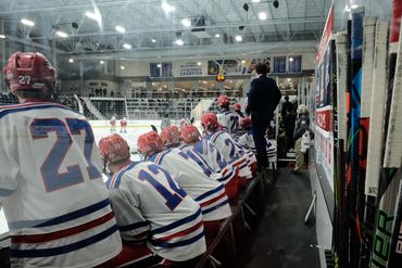 University of Arizona hockey team on the bench at the ACHA 2022 National Tournament.