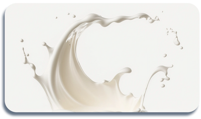 Splash of creamy milk captured mid-air against a light background.