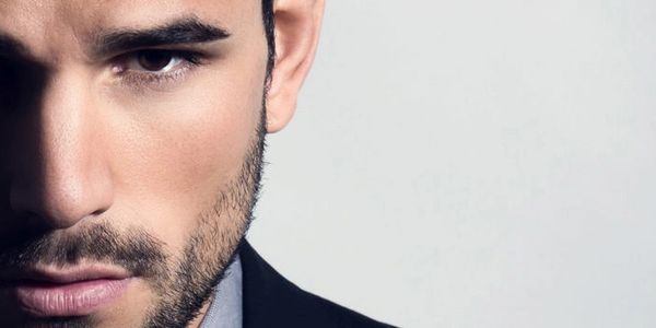 Handsome dark haired man in a business suit.