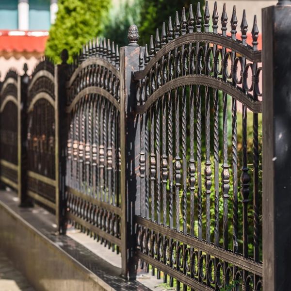 iron fences have added security to your property. fence company near me
